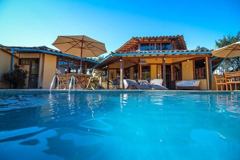 Outdoor pool, pool umbrellas, sun loungers