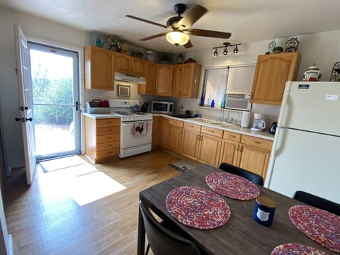Kitchen is equipped with all cookware, utensils, gas range, washer and dryer