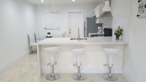 Come enjoy a modern style home and newly renovated 2 BR duplex apartment.