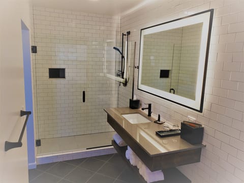 Shower, rainfall showerhead, designer toiletries, hair dryer