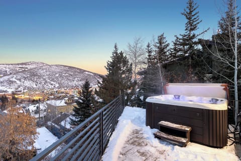 Perched on Lowell Avenue, the Lowell House has incredible views of Park City. Relax in your private hot tub after a day on the mountain and take it all in!
