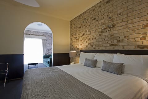 King Spa Suite | Premium bedding, desk, soundproofing, iron/ironing board