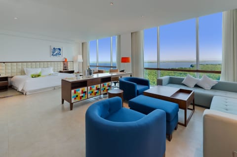 Suite, 1 King Bed | Living area | 37-inch flat-screen TV with digital channels, TV