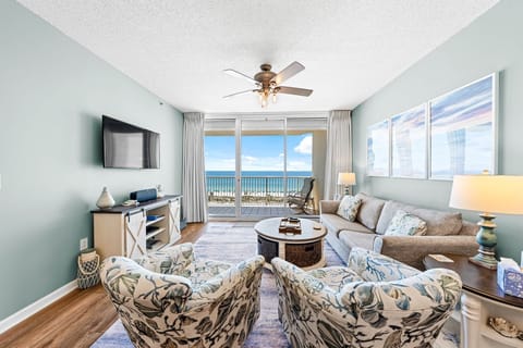 Bright, open living area with comfy seating and beach-inspired décor.