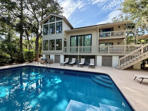 Beautiful Pool Area with Multiple Lounging Areas
