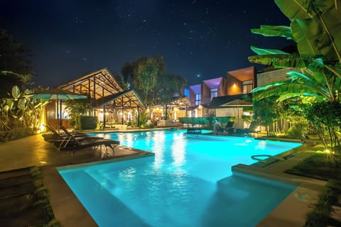 Outdoor pool, open 8:00 AM to 10:00 PM, sun loungers