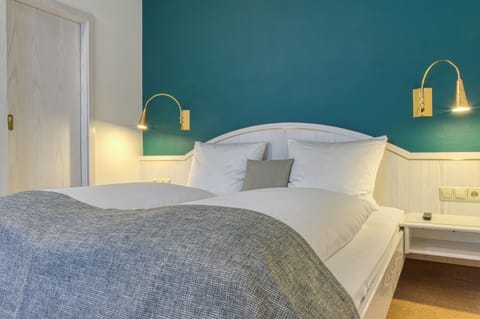 Hypo-allergenic bedding, desk, blackout drapes, soundproofing