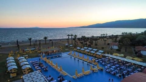 Seasonal outdoor pool, open 10:00 AM to 6:00 PM, pool umbrellas