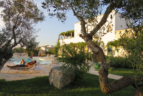 Seasonal outdoor pool, open 10:30 AM to 7:00 PM, sun loungers