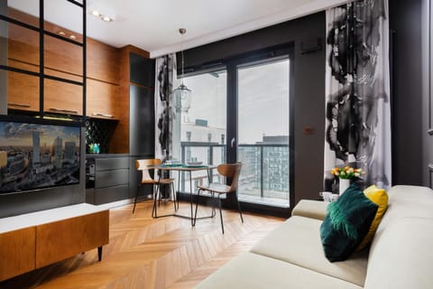 Living room with a comfortable sofa and TV. 