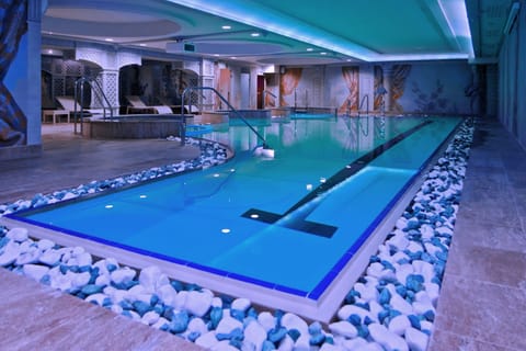 Indoor pool, open 7:00 AM to 10:00 PM, sun loungers