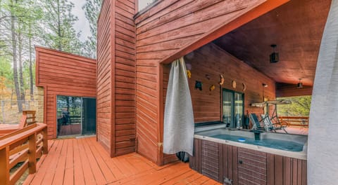Kizzy's Kove wonderful hot tub on covered deck