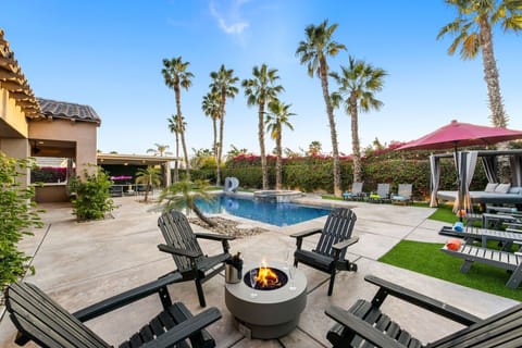 Spark cozy conversations beside the fire pit!