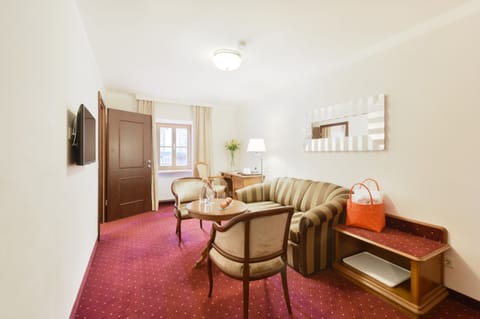 Suite, City View | Living area | Flat-screen TV