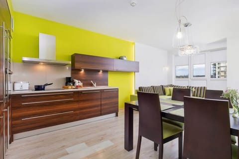 Kitchenette with dining table.