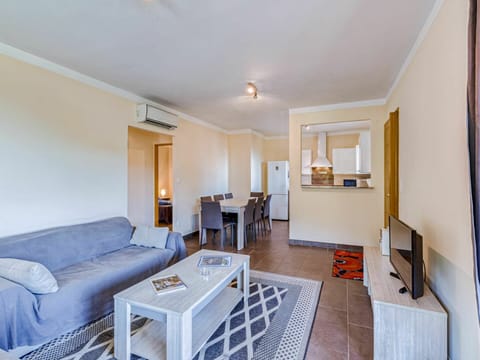 Couch, Furniture, Property, Table, Building, Wood, Lighting, Comfort, Picture Frame, Flooring