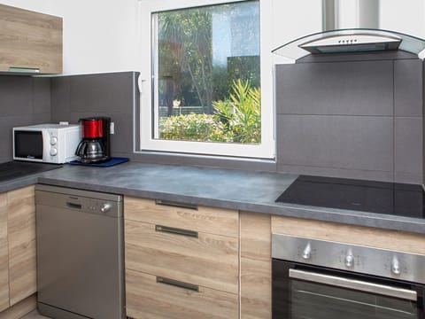 Countertop, Cabinetry, Kitchen, Room, Furniture, Property, Kitchen Stove, Major Appliance, Tile, Drawer