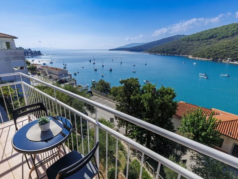 Water, Sky, Cloud, Property, Building, Azure, Blue, Table, Seaside Resort, Lake