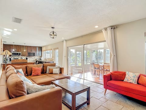Living room, lanai and kitchen