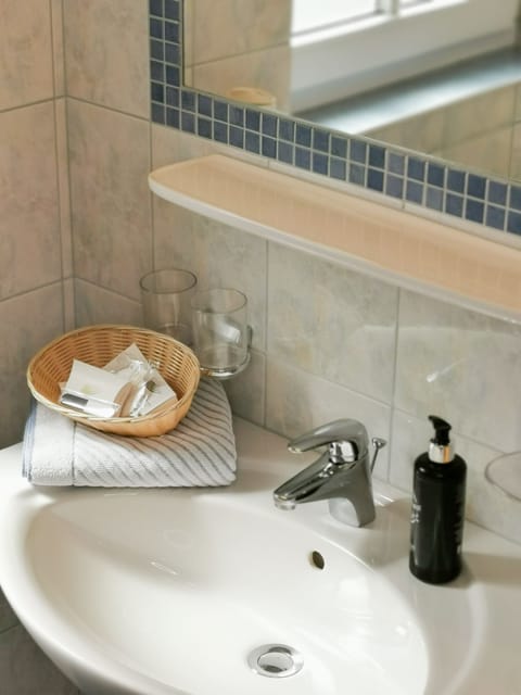 Shower, free toiletries, hair dryer, bathrobes