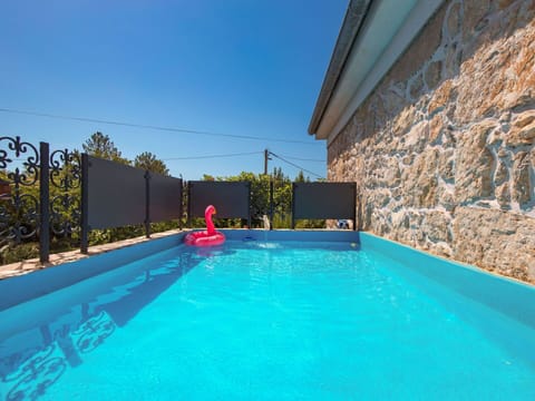 Water, Plant, Swimming Pool, Sky, Building, Azure, Blue, Shade, Leisure, Aqua