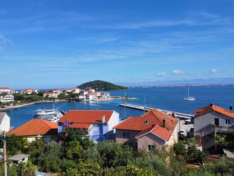Water, Cloud, Sky, Building, Daytime, Property, Nature, Azure, Architecture, Coastal And Oceanic Landforms
