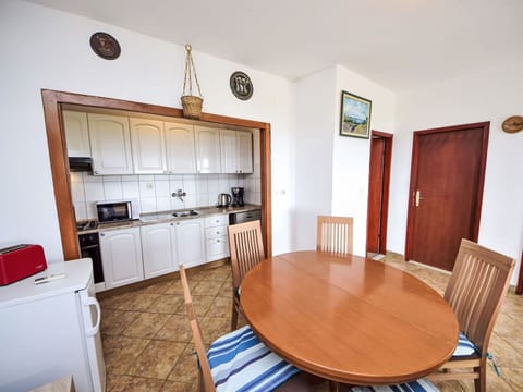 Furniture, Property, Cabinetry, Table, Chair, Wood, Interior Design, Flooring, Floor, Wood Stain