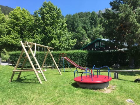 Plant, Sky, Tree, Grass, Shade, Leisure, Playground, Swing, Chute, Recreation