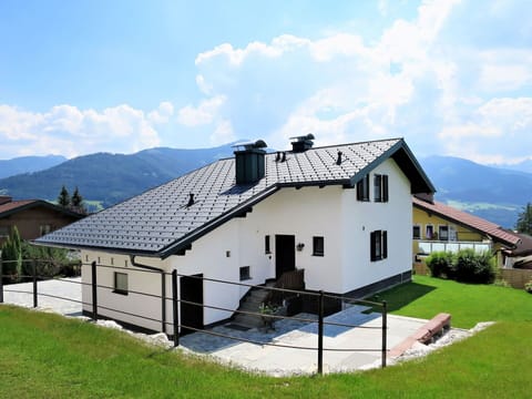 Cloud, Sky, Building, Plant, Window, Property, Mountain, Tree, House, Natural Landscape