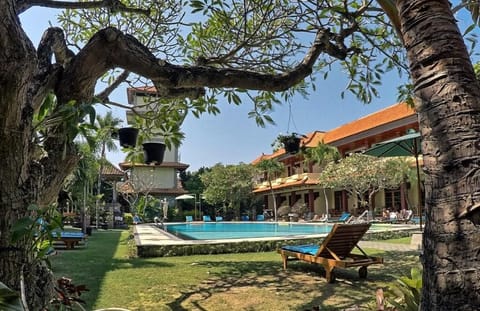 Outdoor pool, open 6:00 AM to 8:00 PM, pool umbrellas, sun loungers