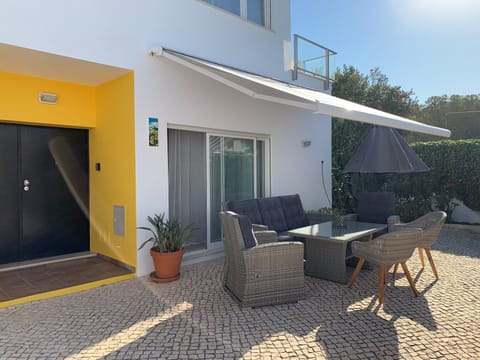 Front of the house with large seating area 