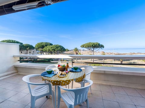 Sky, Table, Property, Furniture, Azure, Cloud, Outdoor Furniture, Chair, Seaside Resort, Interior Design