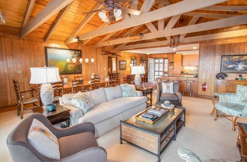 Open-Concept Living, Dining, Kitchen with Vaulted Ceilings and Exposed Beams