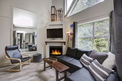 There are amazing  forest views throughout the living room and balcony windows.