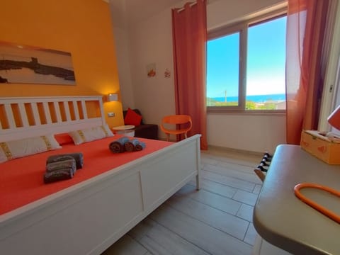 Deluxe Double Room | Minibar, in-room safe, desk, blackout drapes