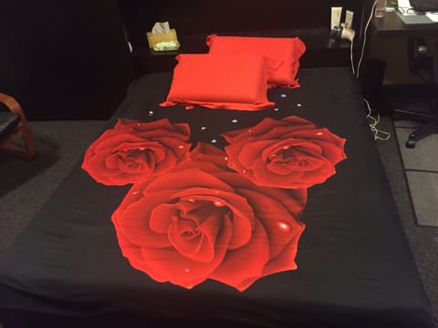 Queen bed with the Meditative Rose by...