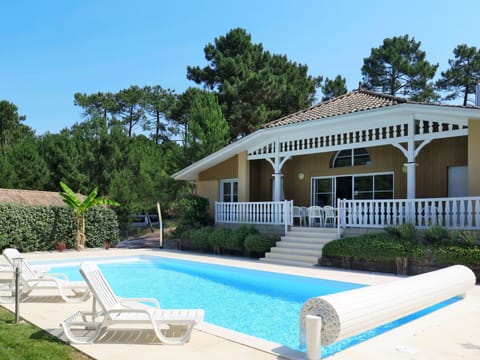 Plant, Water, Sky, Property, Furniture, Building, Swimming Pool, Tree, Shade, Outdoor Furniture