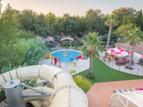 Swimming Pool, Resort, Recreation, Leisure, Human Settlement, Vacation, Shade, Resort Town