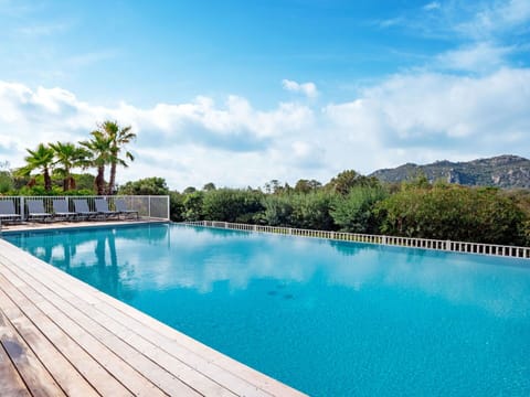 Water, Cloud, Sky, Property, Swimming Pool, Azure, Tree, Plant, Outdoor Furniture, Natural Landscape