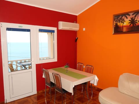 Property, Furniture, Window, Table, Building, Chair, Interior Design, Orange, Cabinetry, Architecture