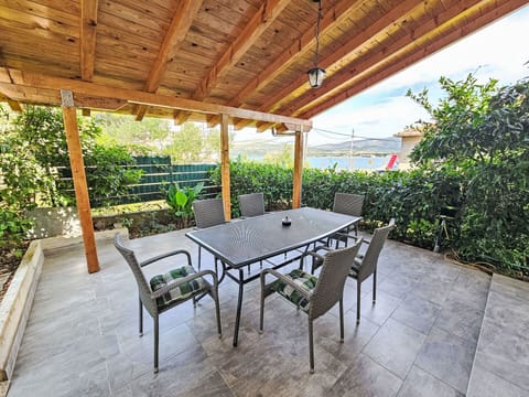 Furniture, Outdoor Furniture, Table, Outdoor Table, Chair, Shade, Porch, Garden, Outdoor Structure, Eco Hotel