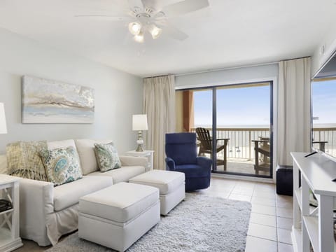 Sit in the living room and look out at the beach and waves