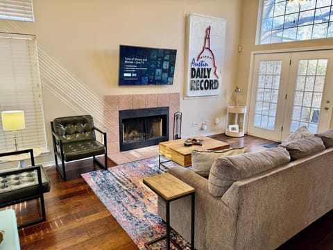 Open Living Room with Smart TV + Queen Sleeper Sofa