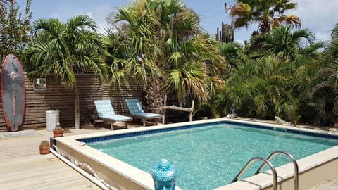 Outdoor pool, open 8:00 AM to 10:00 PM, sun loungers