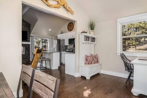 Entry area leads into living room and kitchen