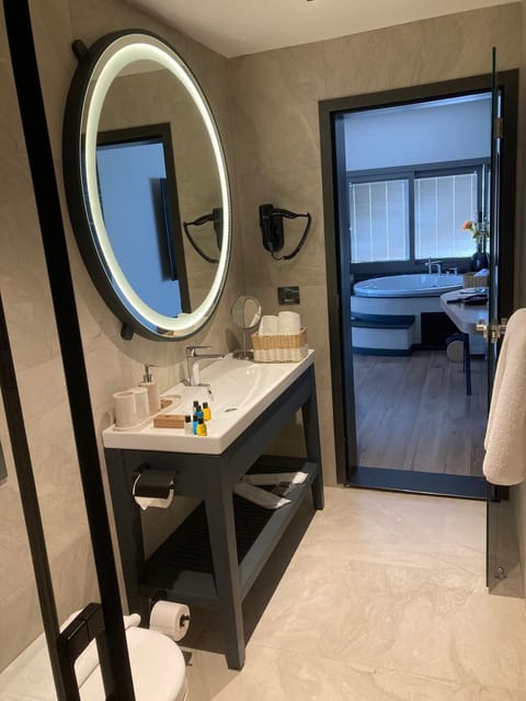 Free toiletries, hair dryer, slippers, towels