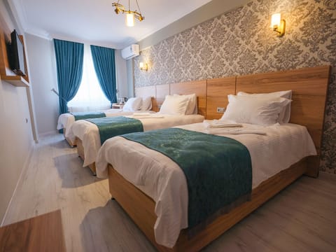 Basic Triple Room | Premium bedding, memory foam beds, minibar, in-room safe