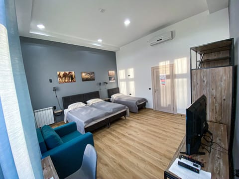 Quadruple Room, Shared Bathroom | Individually decorated, individually furnished, desk, laptop workspace