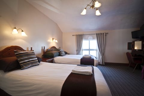 Premier Room, Multiple Beds, Ensuite, Sea View | Desk, iron/ironing board, free WiFi, bed sheets