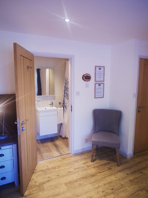 Room 1 (Not Dog Friendly Room) | Bathroom | Shower, hair dryer, towels